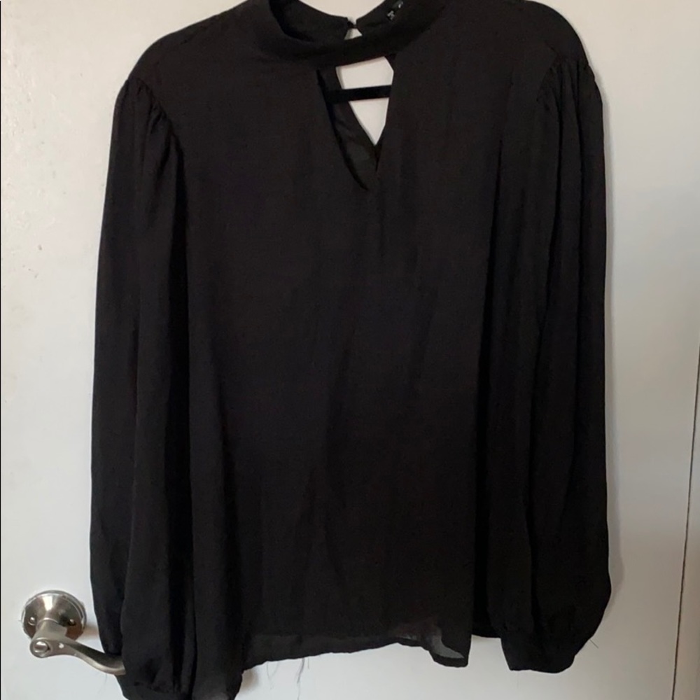 Sheer black blouse